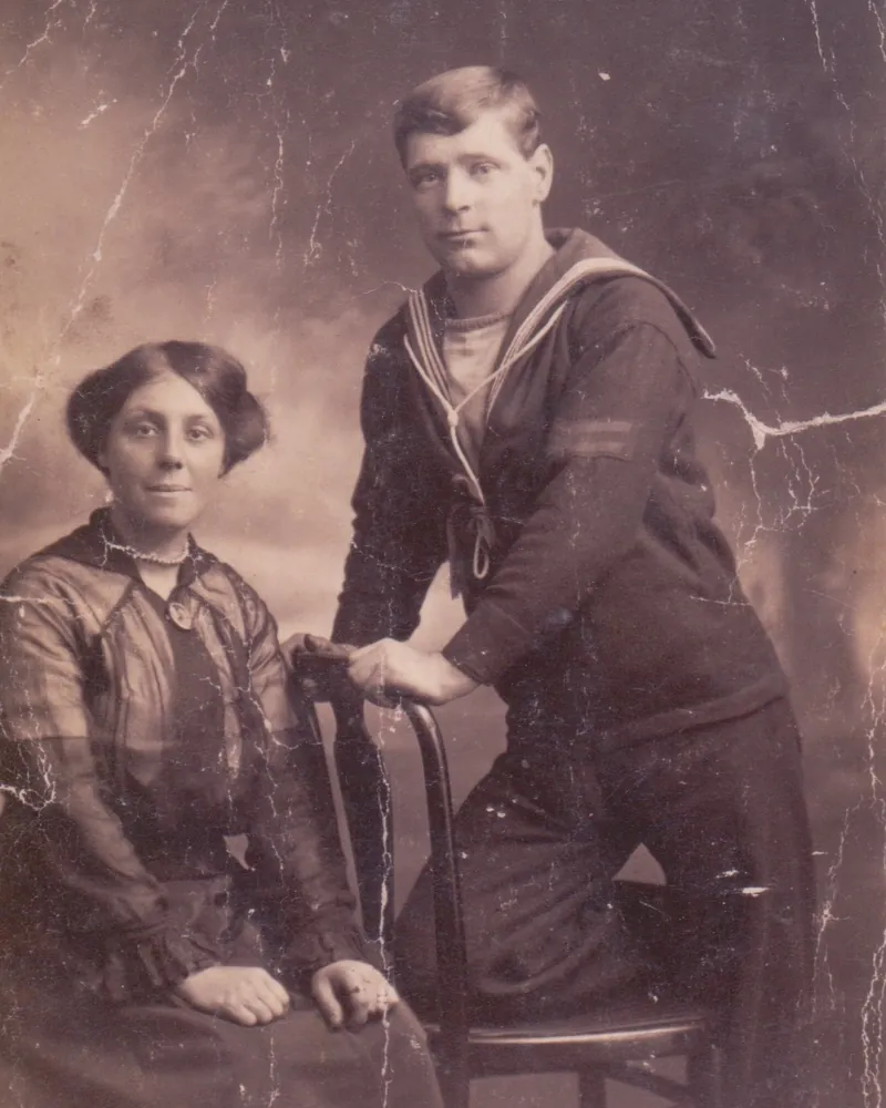 A creased and cracked old photo, before repair